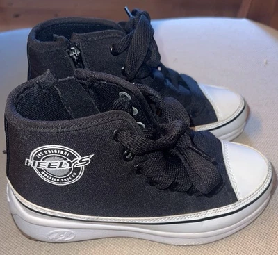 Zapatos de skater Heelys negros blancos de caña alta ruedas talla 2  Foto 1 de 4