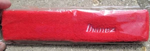 Diadema/ca elástica de tela de rizo promocional Ibenez roja o negra NUEVA EN PAQUETE - Imagen 1 de 7