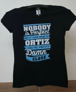 NOBODY IS PERFECT..NAME IS ORTIZ YOU'RE PRETTY..CLOSE Ladies T Shirts Med, Black - Picture 1 of 5