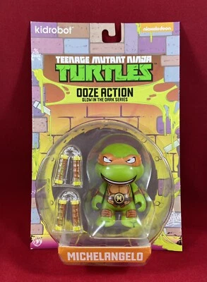 Kidrobot TMNT OOZE ACTION Michelangelo Teenage Mutant Ninja Turtles BRILLA EN LA OSCURIDAD Foto 1 de 2