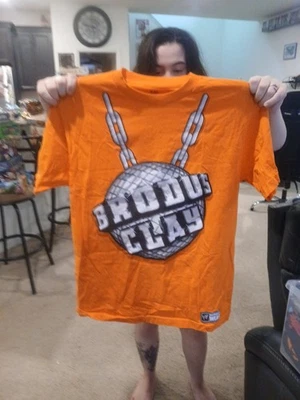 Camiseta BRODUS CLAY WWE Auténtica Naranja Funkasaurus Talla Mediana Súper Rara Foto 1 de 3