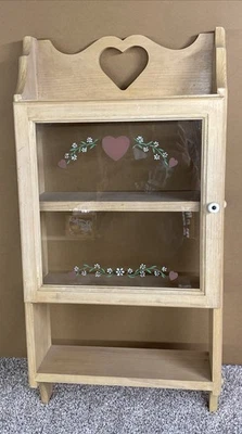VINTAGE 1986 WOODEN 4 Shelf Wall CABINET WITH GLASS DOOR Heart Cut Out 30” - Image 1 of 4