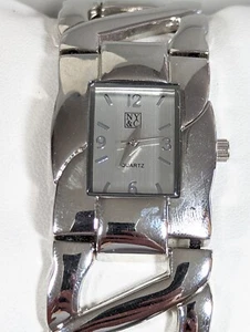 NYC Silver Tone Dial Rectangle Case Stretch Cut Out Band Watch - Picture 1 of 5