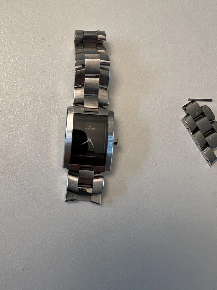 Reloj pulsera Movado Eliro para hombre rectangular esfera negra acero inoxidable Foto 1 de 4