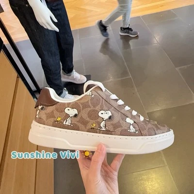 NEW Limited Coach X Peanuts Woman CBZ77 Sneaker Signature Canvas Shoes Tan - Image 1 of 4