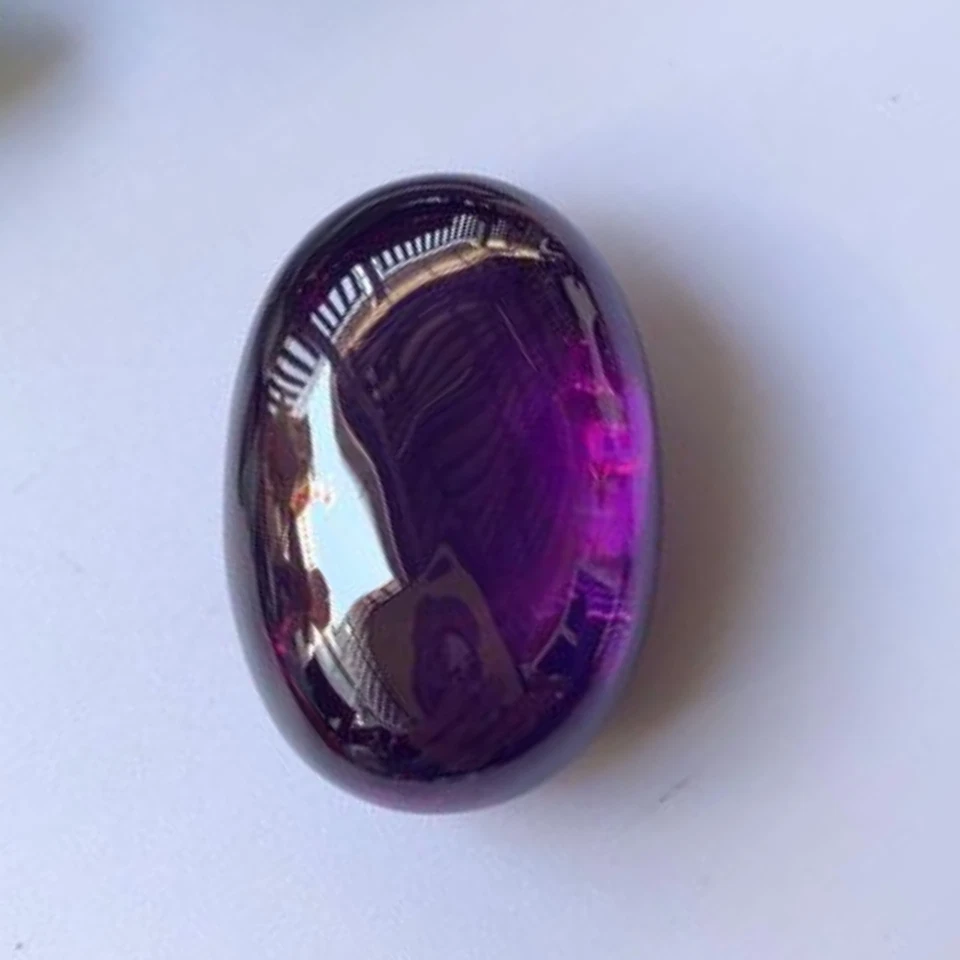 Piedra preciosa ojo Naga púrpura Leklai poder mágico riqueza éxito afortunado santo Foto 1 de 4