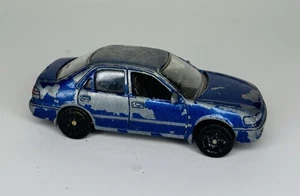 Motormax 6014 Toyota Corolla Blue 1/64 Scale Die-Cast Diorama Model Mint - Imagen 1 de 6