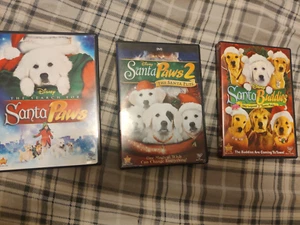 LOT 3 DISNEY DVD's - SANTA PAWS/ SANTA PAWS 2 /SANTA BUDDIES dogs - Foto 1 di 2