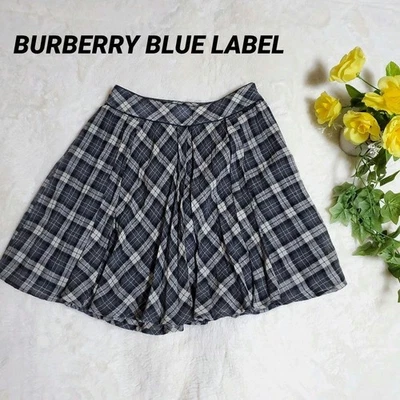 Falda plisada Burberry etiqueta azul a cuadros Nova negra gris talla 38 longitud 47 cm Foto 1 de 4