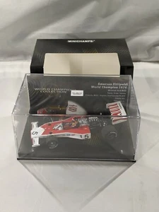 Emerson Fittipaldi, World Champion Collection, 1974 McLaren M23 1:43 MINICHAMPS - Picture 1 of 9