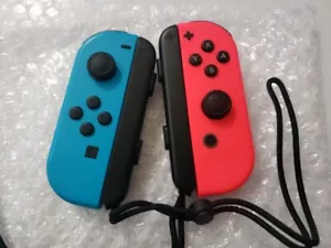 Nintendo Switch Joy-Con Pair Neon Red and Neon Blue, Used- Refurbished!! - Picture 1 of 9