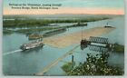 North McGregor Iowa~Raft Being Pulled Thru Pontoon Bridge~Mississippi River~1910