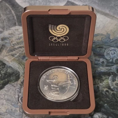 1988 SILVER SOUTH KOREA 10000 WON OLYMPIC PROOF ACHERY 1 OZ COIN WITH CERT. - Image 1 of 4