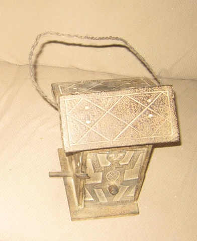 Exotic wood bird house from Pacific Islands, ornately decorated with trabal art Cover