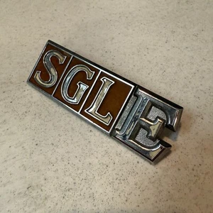 Nissan Cedric CEDRIC 79896-Q3101 SGL-E SGLE SGL E emblem - Picture 1 of 2