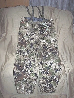 Pantalones con tirantes Sitka grandes para hombre Pantalones Sitka Goretex Caza Sitka Cloudburst Foto 1 de 4