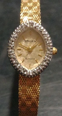 Vintage Gruen Women Dress Diamond Bezel Gold Tone Oval Quartz 18mm Watch 7.5" - Image 1 of 4
