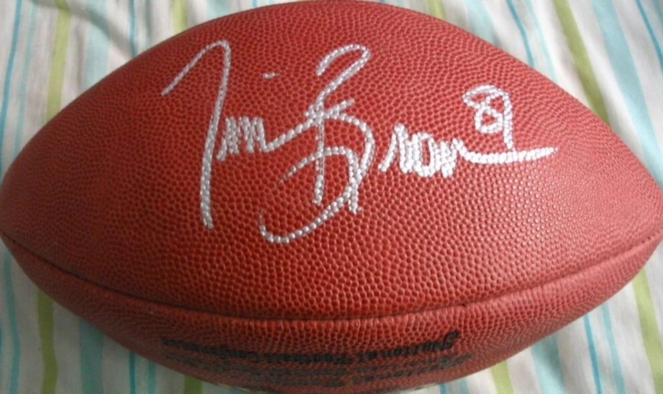 Juego de fútbol americano firmado por Tim Brown Wilson NFL con firma NOMBRE COMPLETO (JSA) Raiders Foto 1 de 2