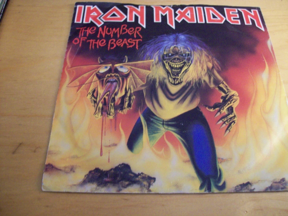IRON MAIDEN -NUMBER OF THE BEAST - RED VINYL -7" -1982 - VG+/FAIR - Image 1 of 4