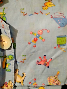 DONDI NWT SCRUB TOP AND MATCHING PANTS SIZE LARGE DUCKS PUPPIES - Picture 1 of 2