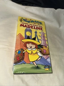 Around The World With Madeline Sing-A-Long Sealed VHS Screener 2000 - Imagen 1 de 4