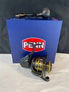 Carrete de pesca giratorio ajustable Penn Battle IV 6000HS negro dorado - Imagen 1 de 11