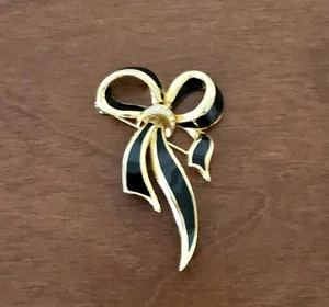 Spilla fiocco nastro vintage smalto nero tono oro spilla strass regalo festa - Foto 1 di 9