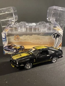 Greenlight 1977 Ford Mustang Cobra II 1/18 Black Gold Stripes - Picture 1 of 10