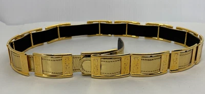 Cinturón de metal y vinilo tono dorado talla M/L 33,25 pulgadas a 35 pulgadas de largo X 1 pulgada de ancho Foto 1 de 4