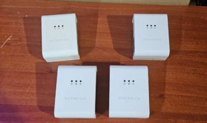 4 Netgear XE104 85 Mbps Wall-Plugged Ethernet Powerline Switch 4 Port - Bild 1 von 3