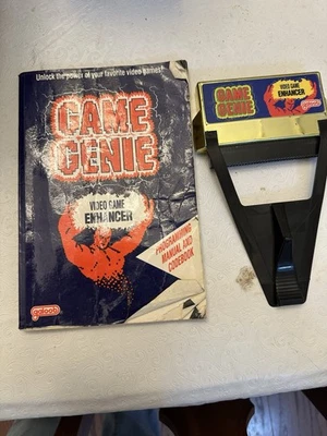 Nintendo NES Game Genie Game Enhancer (Model 7356, Galoob) And Cheat Code Manual - Image 1 of 4
