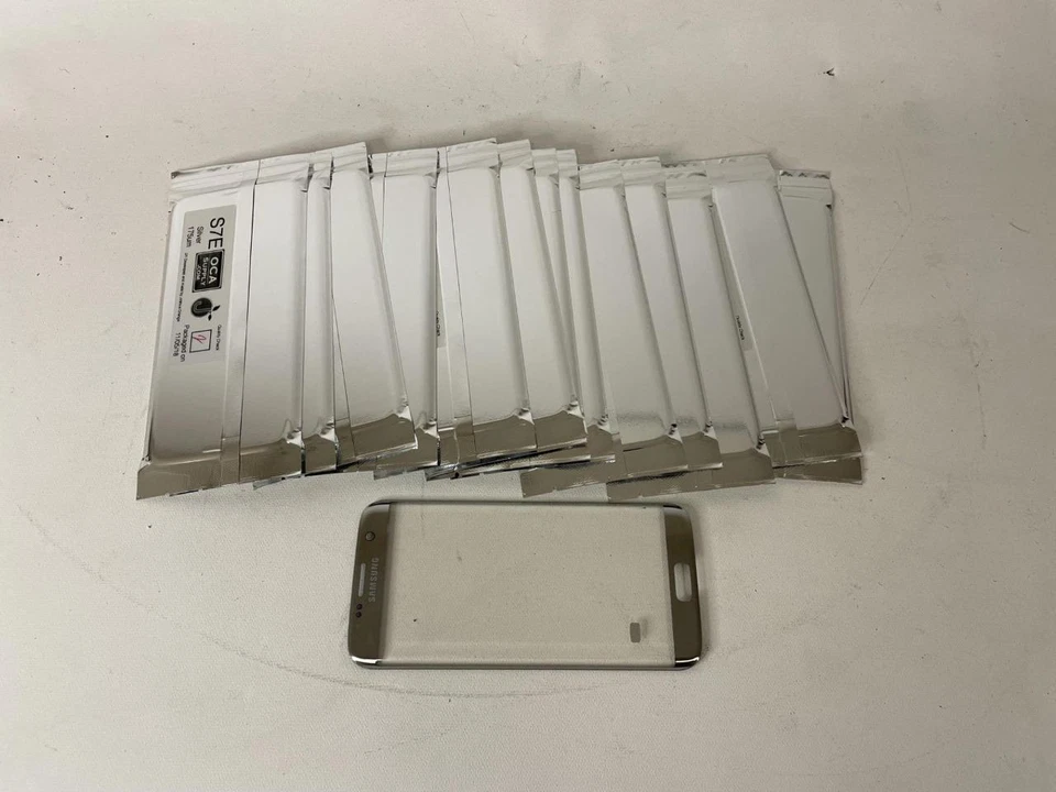 Lot of 13 Samsung Silver S7 Edge Front Glass Lens Replacements - Image 1 of 1