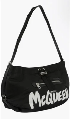 Bolso de hombro Alexander McQueen T-Bar Sling Pouch para mujer en blanco y negro  Foto 1 de 4