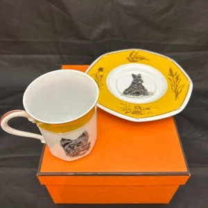 Juego de tazas y platillos Hermes Scottish Terrier porcelana amarilla con caja sin usar - Imagen 1 de 6