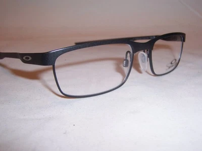 NUEVAS GAFAS OAKLEY PLACA DE ACERO OX 3222-01 POLVO CARBÓN 52mm RX AUTÉNTICAS 3222 Foto 1 de 4