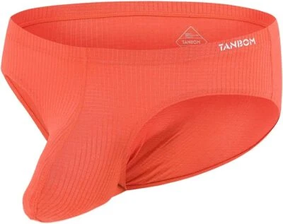 Calzoncillos sin etiquetas de tiro bajo que mejoran el bulto para hombre bolsa de pelota grande ropa interior lisa Foto 1 de 4