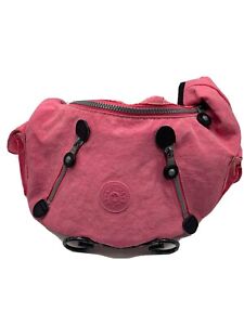 A Hot Pink Kipling Shoulder Bag With Monkey Keychain.