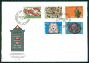 SCHWEIZ FDC 1986 ARCHÄOLOGIE KUNST ART MÜNZEN COINS GALLIERKOPF XI. LEGION m3458 - Imagen 1 de 2