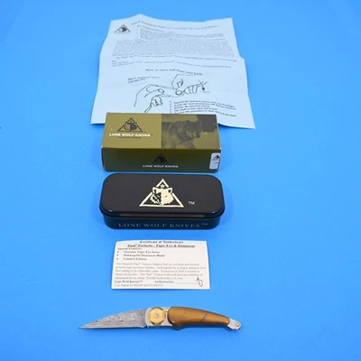 CUCHILLOS LOBO SOLITARIO, ESCASOS LT. ED.  CUCHILLO OJO DE TIGRE PAUL PERFECTO DAMASCO COMO NUEVO Foto 1 de 4