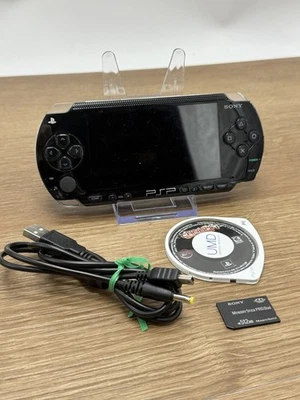 Consola Sony PSP-1001 + Batería Nueva + Cable Cargador + Memory Stick + Carbono NFS Foto 1 de 4