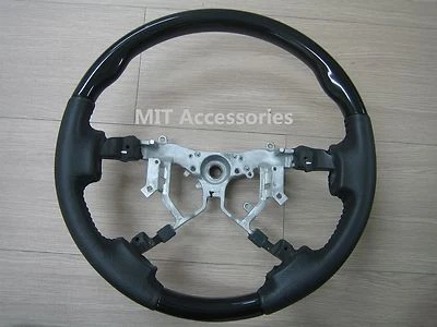 For Toyota TUNDRA 2nd Gen. 2007-2013 Black Piano genuine leather steering wheel - Image 1 of 4