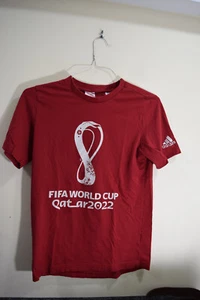 2022 FIFA World Cup Qatar YOUTH 13-14 Graphic Logo Soccer T-shirt Red - Picture 1 of 12