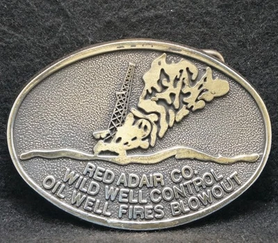 WL05167 VINTAGE 1970s *RED ADAIR WILD WELL CONTROL* OILFIELD COMPANY BELT BUCKLE - Image 1 of 2