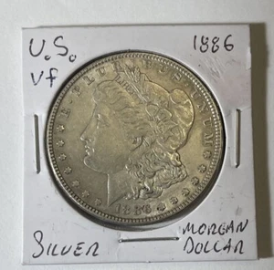 1886 $1 Morgan Silver Dollar - Picture 1 of 2