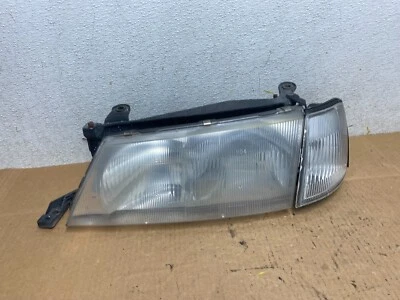 Faro lateral izquierdo del conductor Nissan Sentra 1995 a 1998 OEM N4384 DW Foto 1 de 4