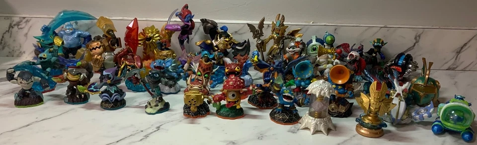 Lote Skylanders - 34 figuras + vehículos - Trap Team, Giants, Swap Force, Core Cha Foto 1 de 4