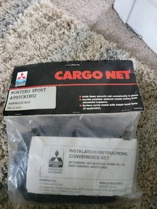 1998  MITSUBISHI MONTERO SPORT 1999 NEW TRUCK VAN CARGO NET cib vintage - Picture 1 of 6