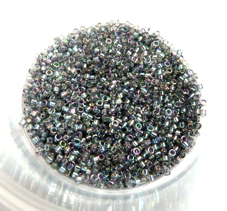 11/0 DELICA ~ BRILLO ORO GRIS ~ DB 107 ~ 7 gramos ~ CUENTAS SEMILLAS DE VIDRIO Foto 1 de 1