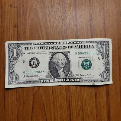 Billete de un dólar Star de $1 H00699902* Circulado 1999 St Louis Foto 1 de 4