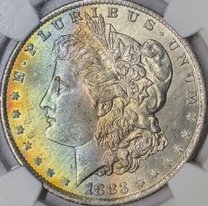 1883 O MS64 NGC Morgan with rainbow toning - Picture 1 of 3